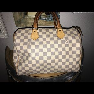 White Louis Vuitton bag